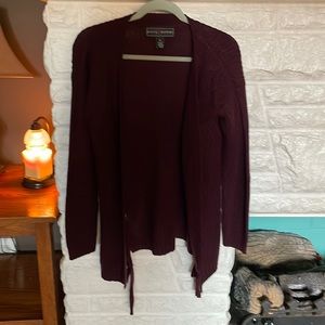 Polly Esther cardigan sweater. Cute tie detail on both sides!